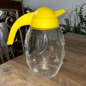 Solmaz Mercan 48 oz embossed juice carafe with yellow lid